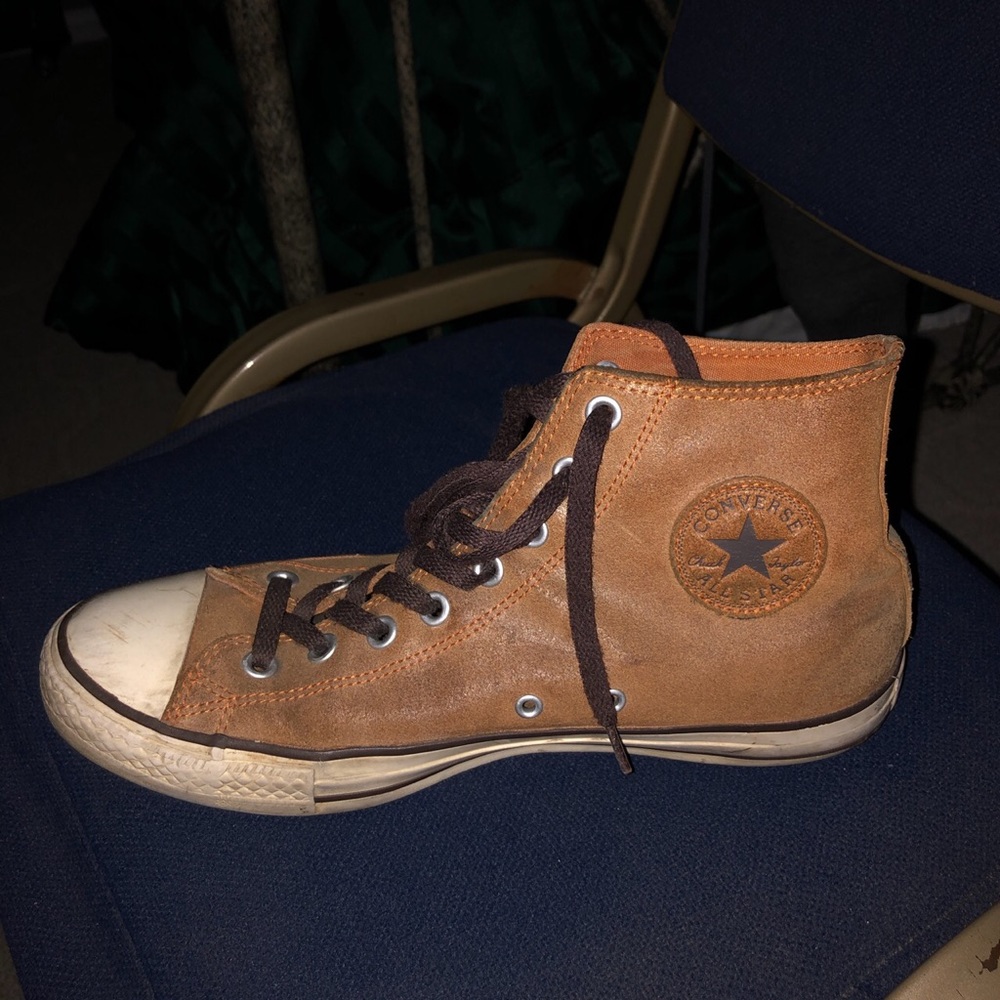 Brown leather converse